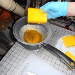 Cheese was bought in bulk and dipped in wax to preserve it.