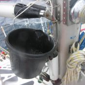 To top up my fresh water I would rig a bucket under the gooseneck and catch the rainwater as it ran off the mainsail.